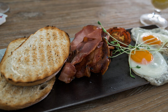 Grilled  egg and bacon breakfast 
