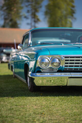 American car, headlight on blue old retro car