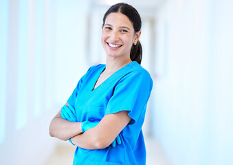 Woman, nurse smile and portrait with arms crossed and job in a hospital and clinic. Employee,...