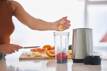 Fruit, smoothie and morning with hands of woman in kitchen for gut health, diet and breakfast. Wellness, detox and nutrition with closeup of female person at home for cooking, juice and weight loss