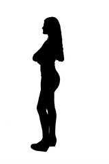 side view silhouette of young woman standing and arms crossed  in short dress on white background