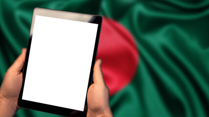 Man hold tablet phone pc gadget with white blank screen, copy space for text, image or message. Flag of Bangladesh country on background. Technology, information, business 
