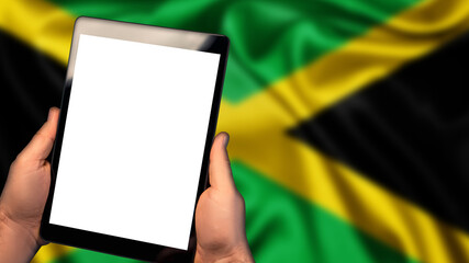 Man hold tablet phone pc gadget with white blank screen, copy space for text, image or message. Flag of Jamaica country on background. Technology, information, business
