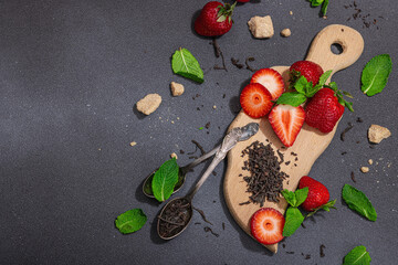 Refreshing summer drink. Dry tea leaves, fresh fruit and herbs. Set of ingredients for cooking tea