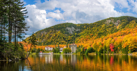 Fototapeta premium Dixville Notch State Park in Autumn - New Hampshire - view towards The Balsams reflected in Lake Gloriette