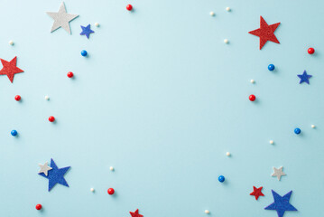 Create a star-spangled spectacle on your table this Fourth of July! Top view of patriotic elements...
