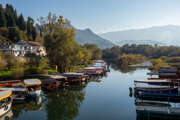 Tourist boats parked up near the Lake Skadar visitors centre in Montenegro.