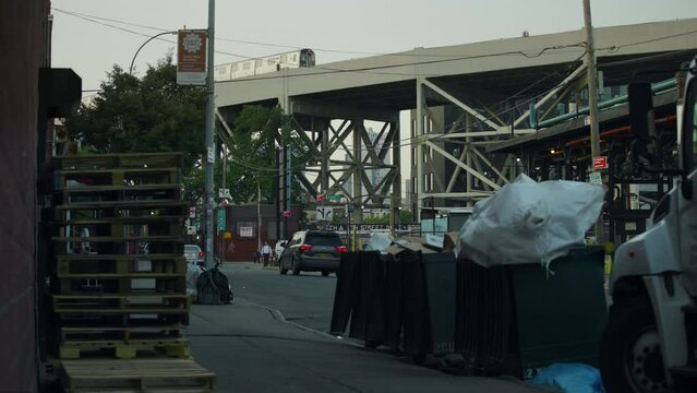 Red Hook Brooklyn, NYC &mdash; Garbage Piled On Street Under Elevated Subway Train
