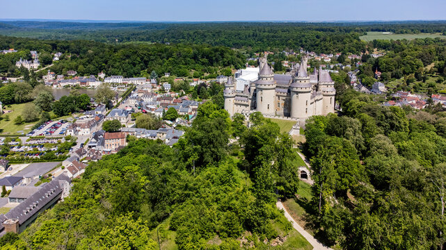 Aerial view of the Castle of Pierrefonds in the forest of Compi&Atilde;&uml;gne, Picardy, France - Medieval castle restored by the French architect Eug&Atilde;&uml;ne Viollet-le-Duc in the 19th Century