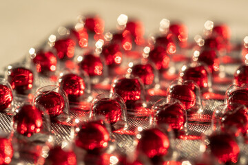 Macro blisters with vitamin E capsule. Sun protection. Beauty and health concept.