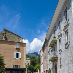 Fototapeta Corsica, Erbalunga, typical houses in the village in summer obraz