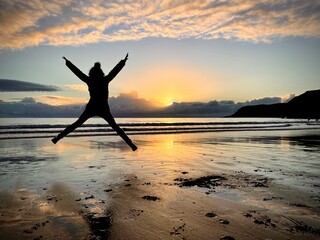 Happiness on a sunset beach