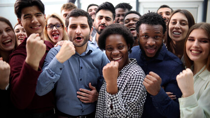 Obraz premium Confident diverse college students show fist up.