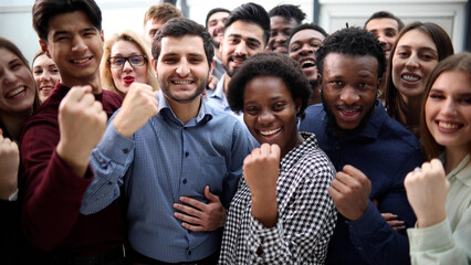 Obraz premium Confident diverse college students show fist up.