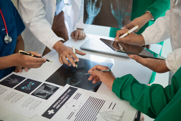 concept of mobilizing ability of medical team in conference room to diagnose and treat disease...