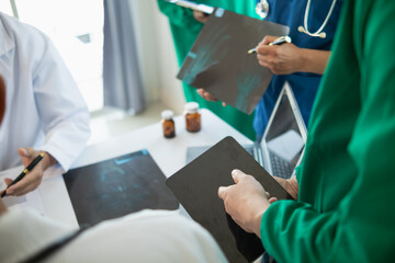 concept of mobilizing ability of medical team in conference room to diagnose and treat disease...
