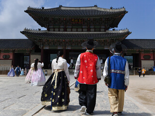 Tourists experience history wearing hanbok, a traditional costume, at the Gyeongbokgung Palace, a royal palace of the Joseon Dynasty in downtown Seoul.