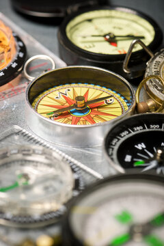 Close-up of a group of compasses