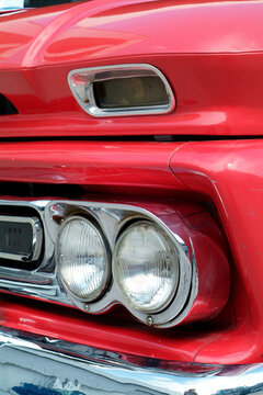 Front detail of red American pickup truck from the sixties