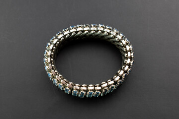 Chunky blue crystal bracelet, unique vintage jewelry background, rhinestone jewelry concept, promotional photo for an online jewellery store