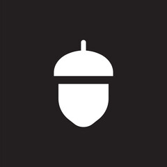 Acorn icon on black background. Flat design style.