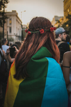 Lady wearing pride flag