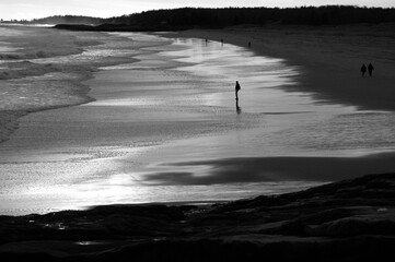 Fototapeta na wymiar solitary moment at the beach