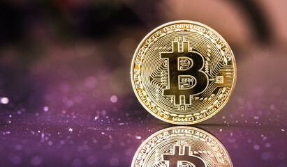 Bitcoin. Crypto currency Gold Bitcoin, BTC, Bit Coin. Macro shot of Bitcoin coins isolated on black background.