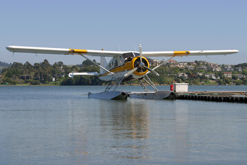 A seaplane floats on standby.