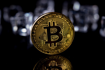 Bitcoin. Crypto currency Gold Bitcoin, BTC, Bit Coin. Macro shot of Bitcoin coins isolated on black background.