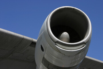 A section of a jumbo jet, viewed from below.