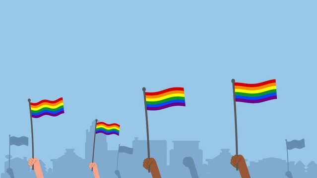 people waving pride flags on the blue background