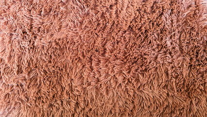 Brown wool style rug as background