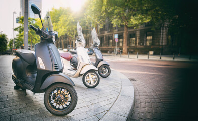 Scooters vintage moto parked in European city center