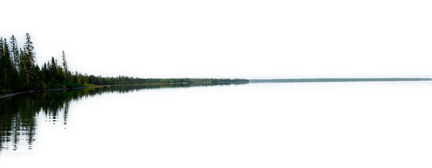 A long lakeshore reflecting in calm water. Both the sky and water have been removed.
