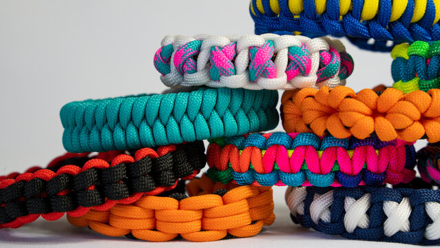 Lots of braided paracord bracelets
