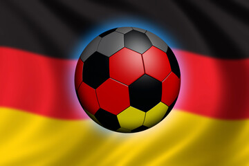 Fototapeta premium Soccer in Germany - soccer ball and flag of germany (flag out of focus)