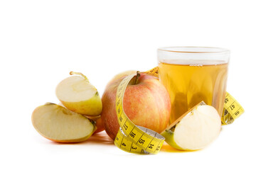 Fresh apple juice with a tape measure