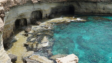 Sea caves cape greco Cyprus blue lagune water sea travel views - obrazy, fototapety, plakaty