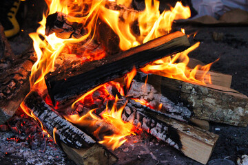 Golden fire in fireplace during the camping night somewhere in Bosnia and Herzegovina