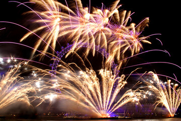 london eye light show and firework during new year eve - obrazy, fototapety, plakaty