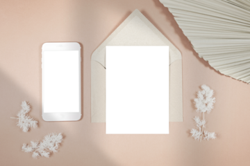 Wedding stationery suite cards styled with minimalist boho decor and on-trend shadow photography. 5x7 invitation card and smartphone cell mobile phone evite mockup. 