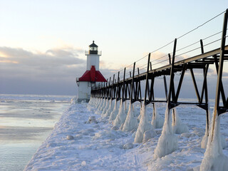 Snow and ice cover pier at St. Joseph Michigan