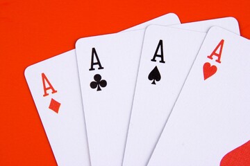 Close up of a four aces card.