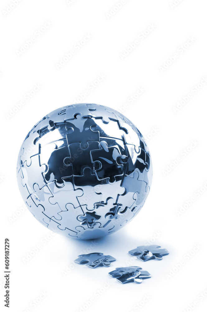 Aufkleber metaphor image with globe and falling peaces against white background