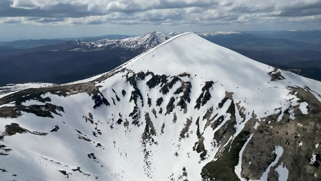 A panorama video of Hoverla mountain with snow on it, Carpathians
