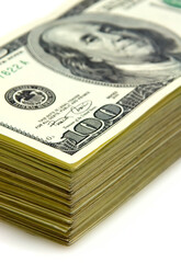 close-up view of stack of one hundred dollar bancknotes