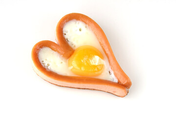 heart sausages with fried eggs for lovely breakfast