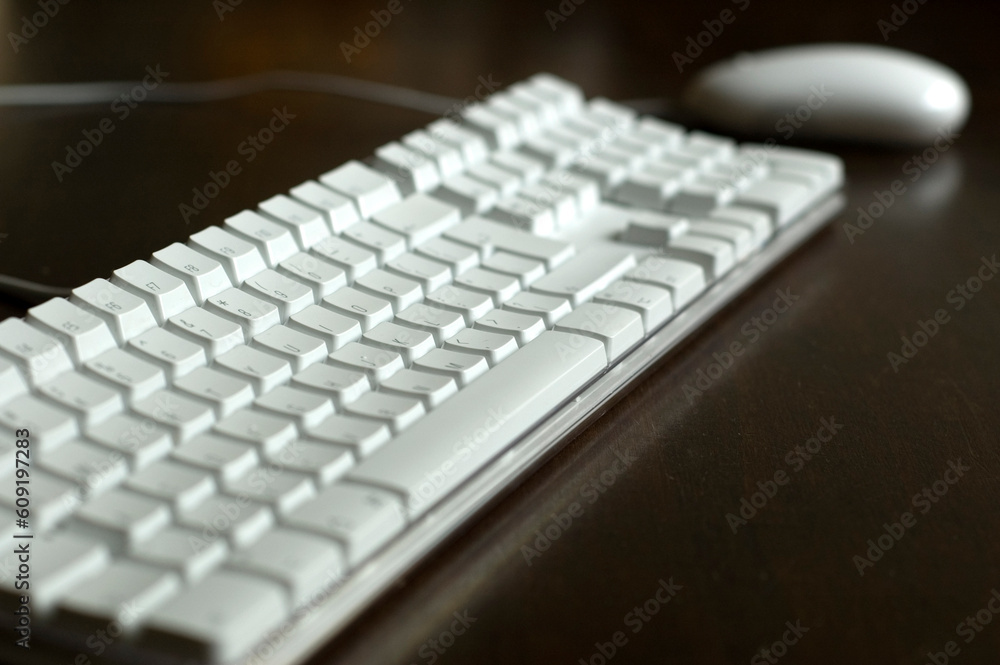 Aufkleber closeup of keyboard and mouse. focus on middle of keyboard.