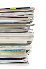 A stack of magazines over a white background